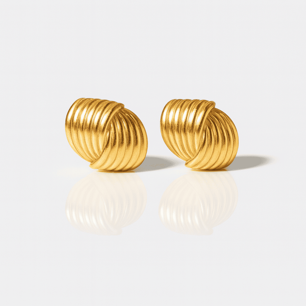 Gold stud earrings with ribbed folded design