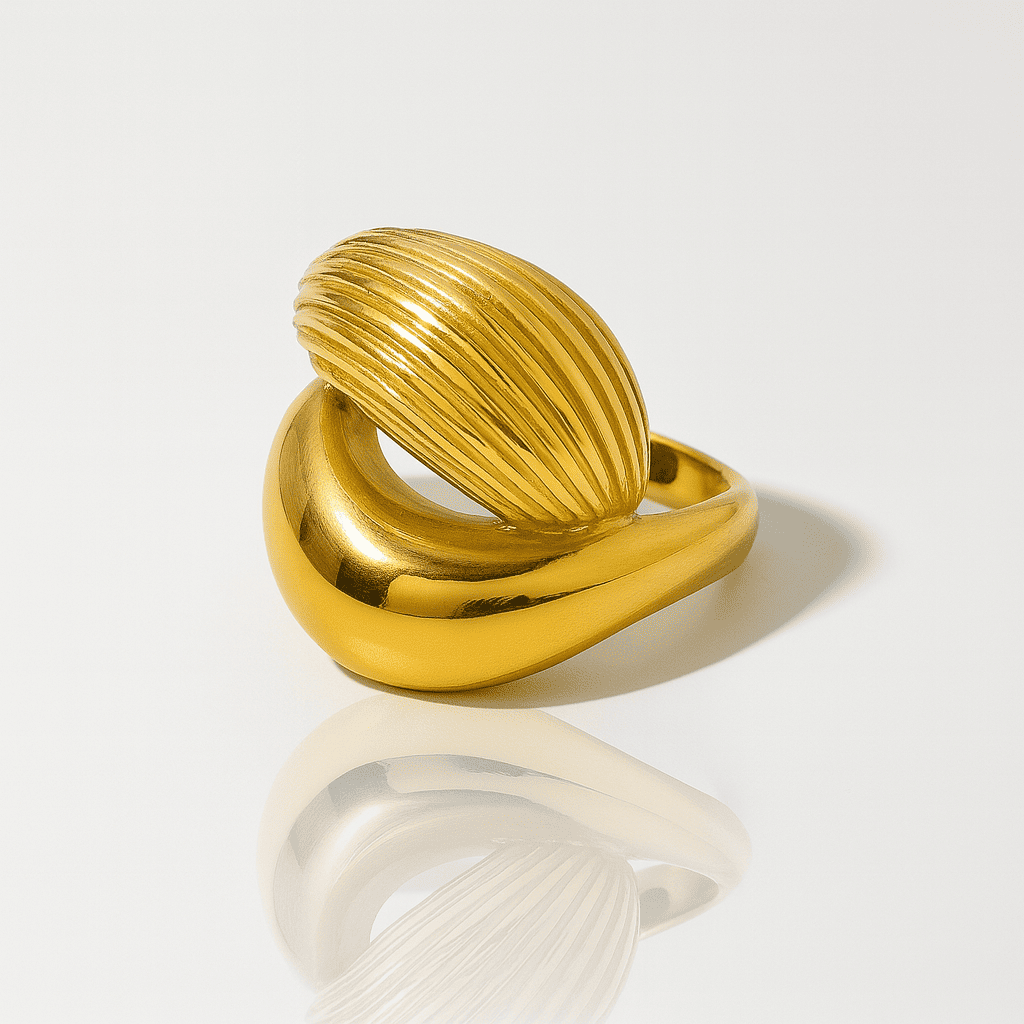 Maximalist gold and silver ring with molten drop texture