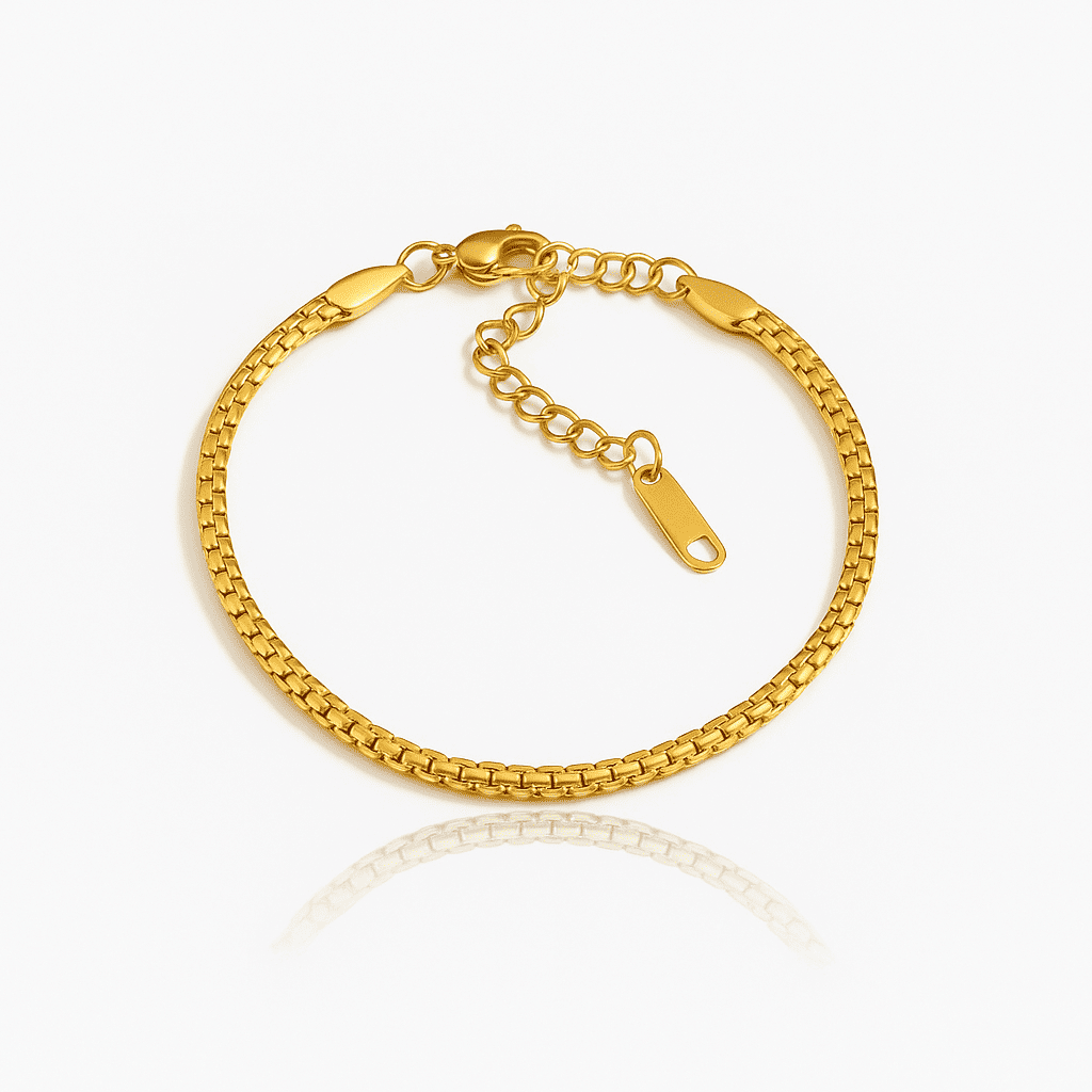 Minimal gold chain bracelet with adjustable clasp on white background
