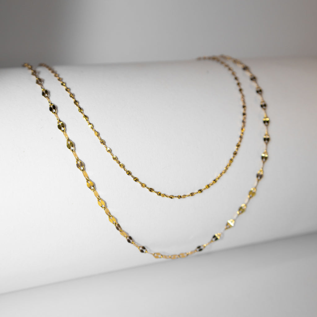 shimmer gold chain necklace, reflective finish