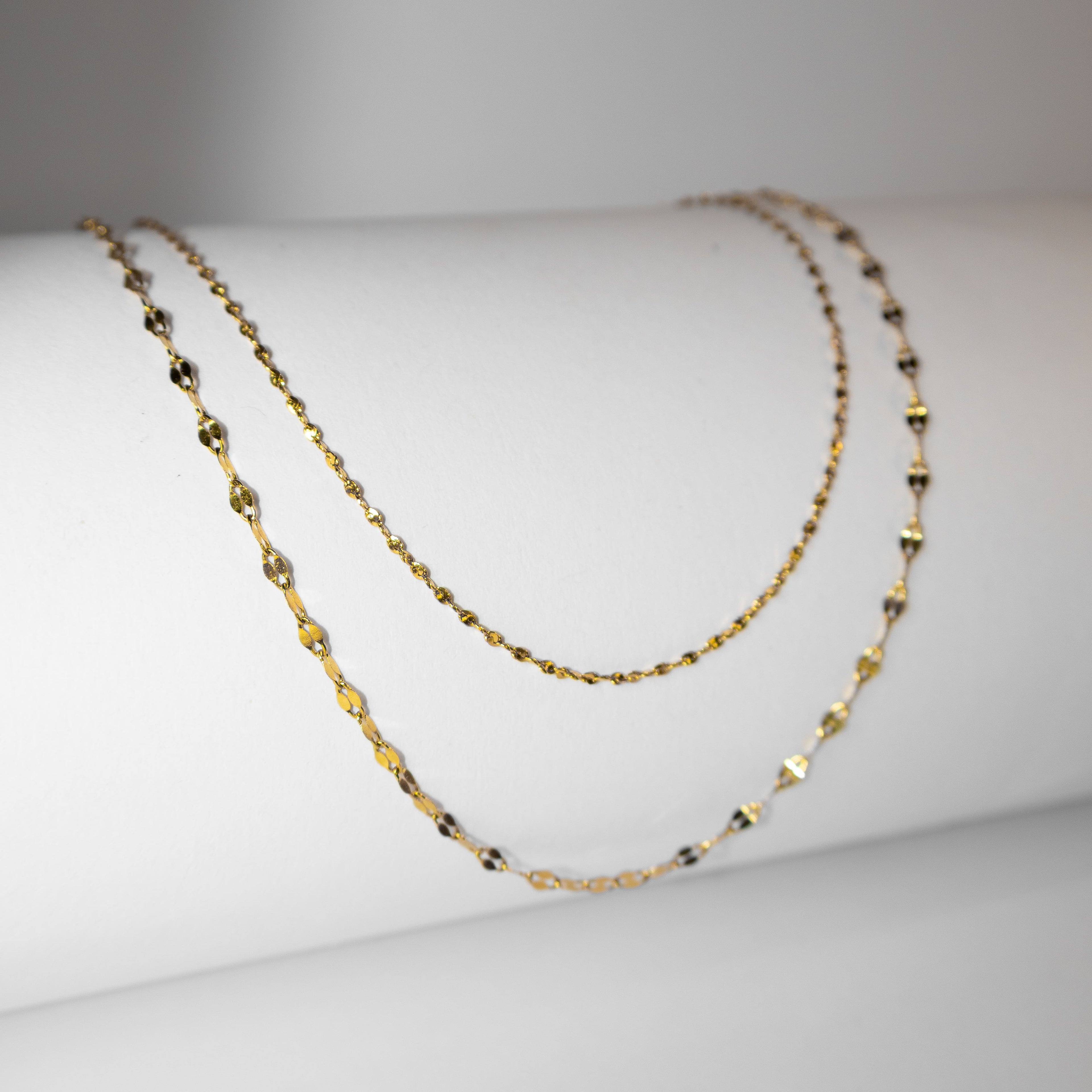 shimmer gold chain necklace, reflective finish
