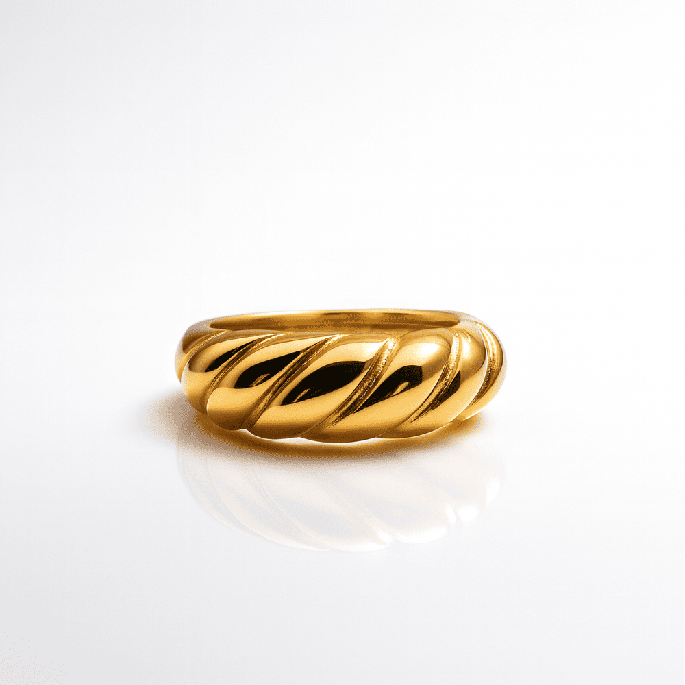 Minimalist gold ring with stainless steel texture and subtle shine