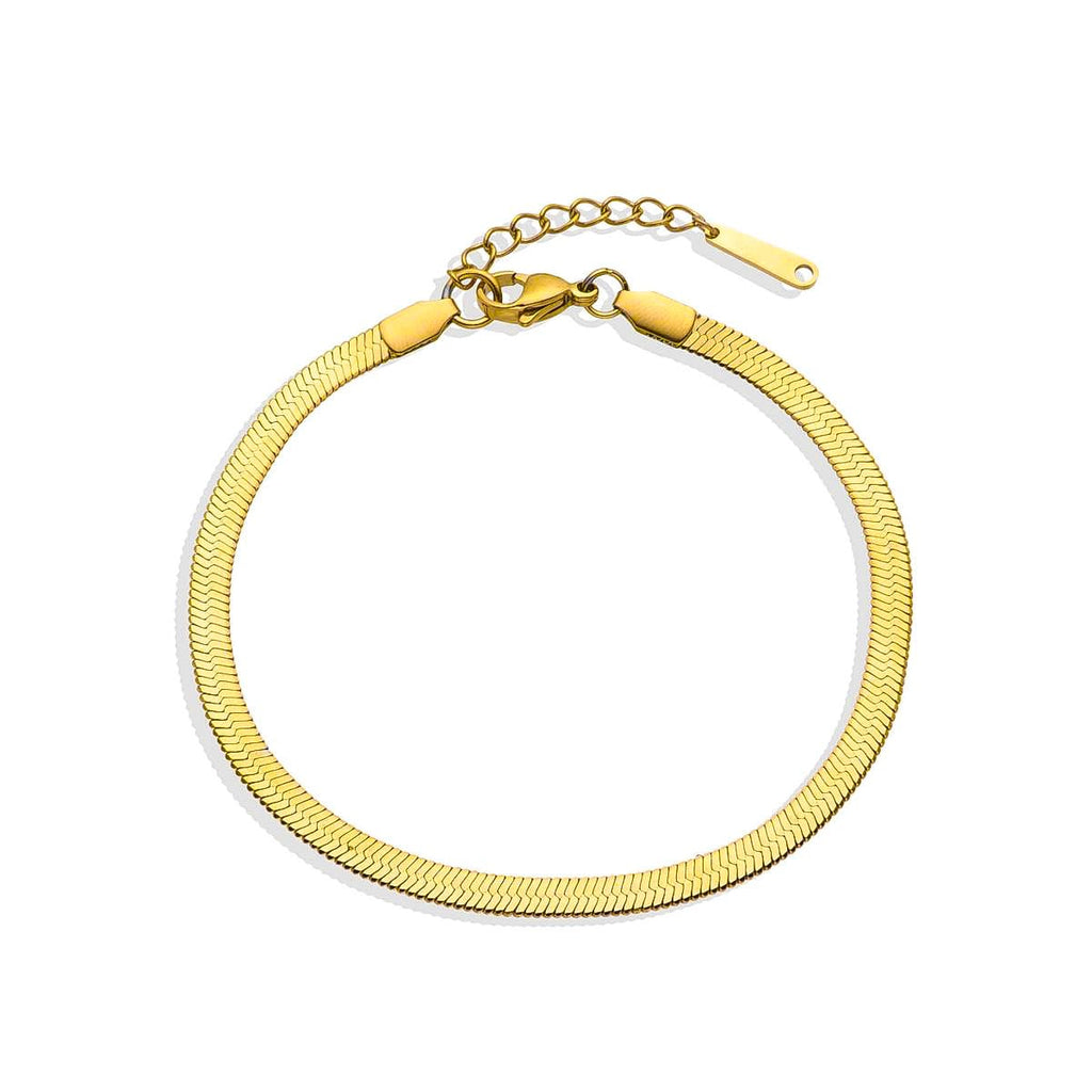 Herringbone gold bracelet with a flat, reflective pattern